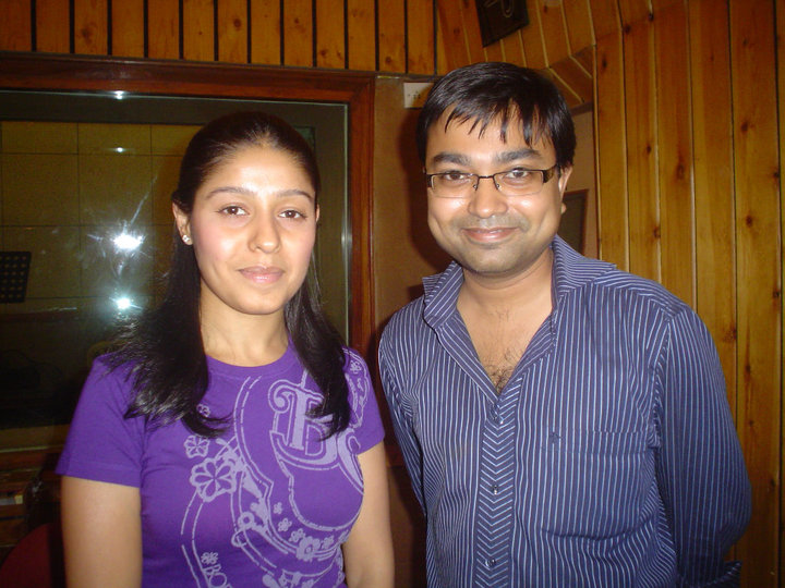 Sunidhi Chauhan and Drono Acharya in a recording studio—milestone in his journey in media & broadcasting.