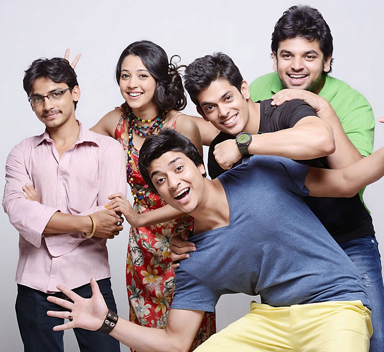Anwesha and fellow aspiring artists during a Mumbai ad campaign, smiling and celebrating creative friendship and dreams.